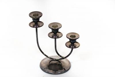A modern silver three-branch