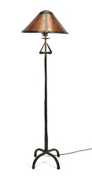 A modern wrought iron floor lamp
