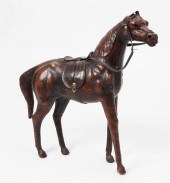 A MOLDED LEATHER MODEL OF A HO