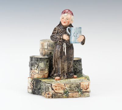A Monk Figural Match Strike