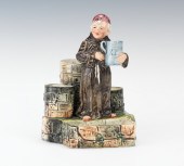 A Monk Figural Match Strike Ci