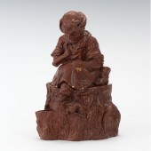 A Monochrome Figural Tobacco J
