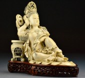 A Monumental Chinese Carved Iv