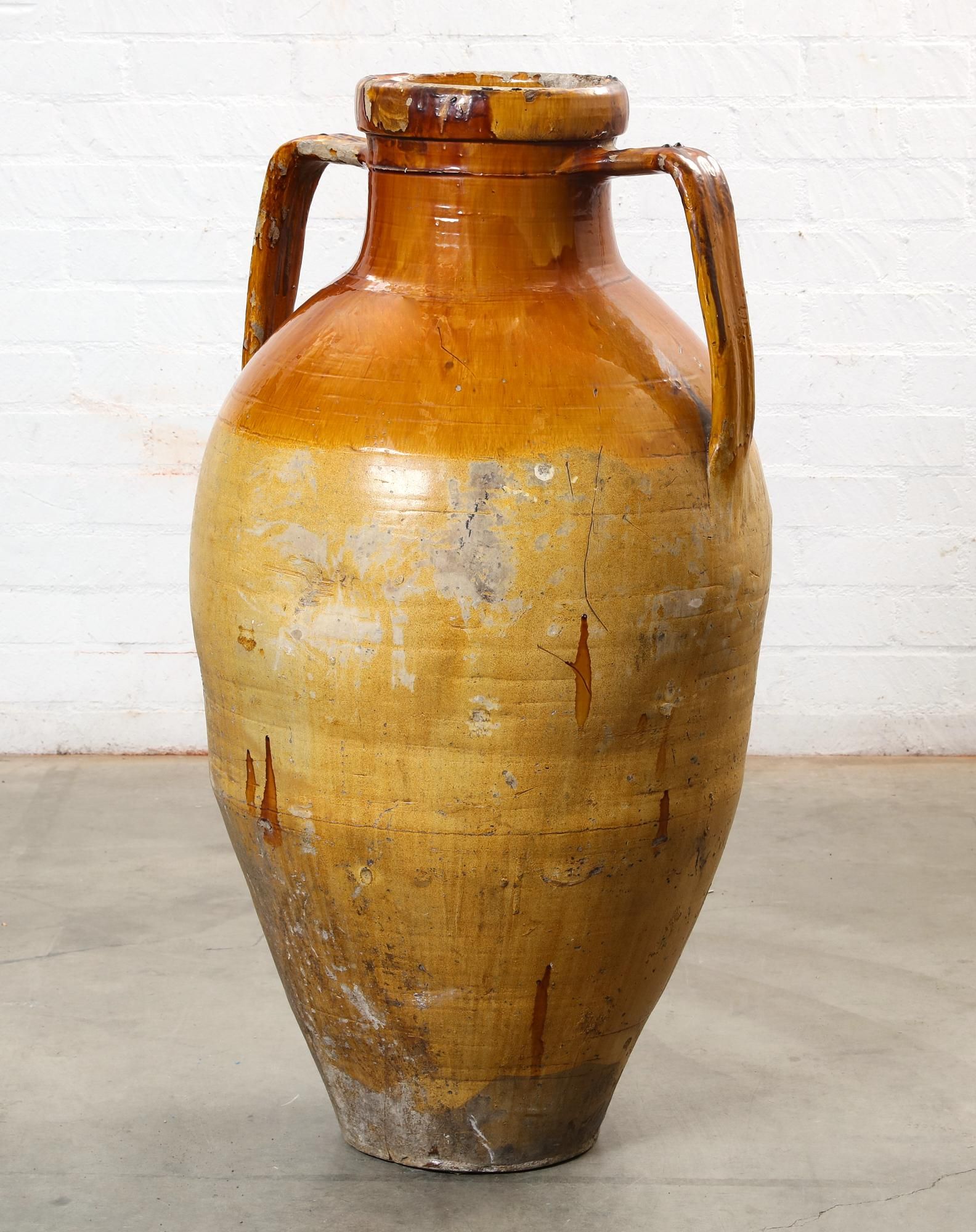 A MONUMENTAL PARCEL YELLOW GLAZED