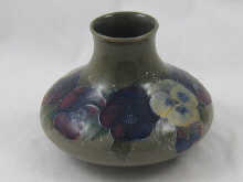 A Moorcroft vase with tube line
