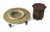 A Moroccan low brass table wit