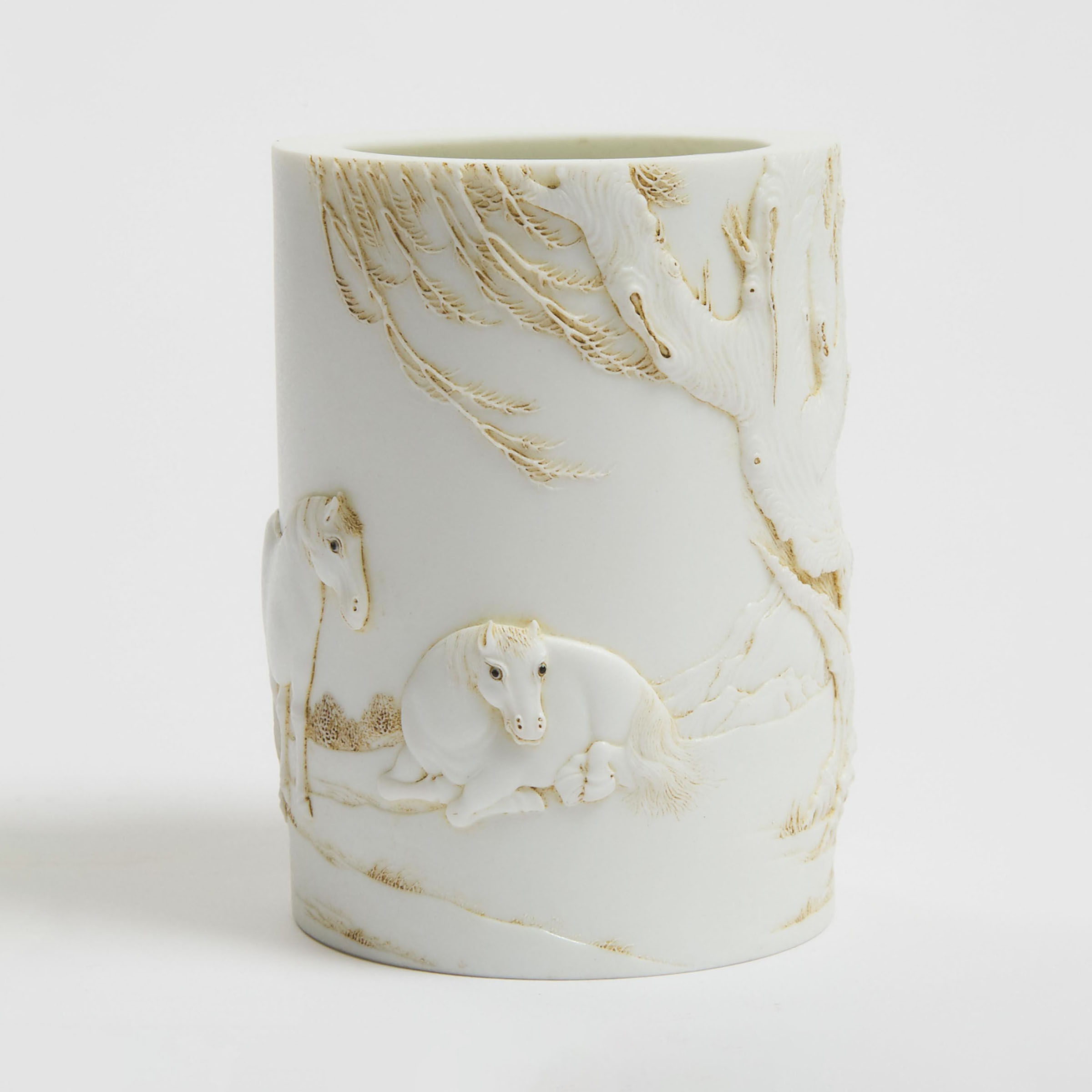 A Moulded White-Glazed Brushpot,