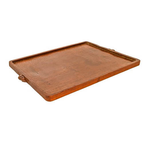 A Mouseman oak tray, with two