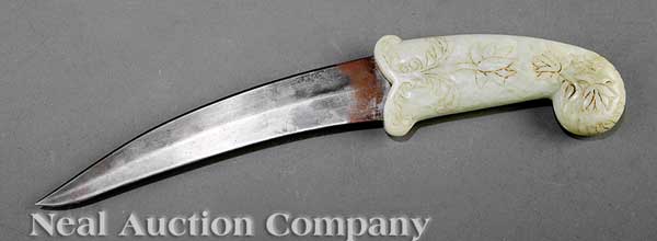 A Mughal Celadon Jade Hilted