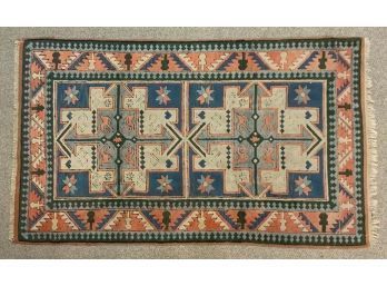 A multi colored oriental area rug