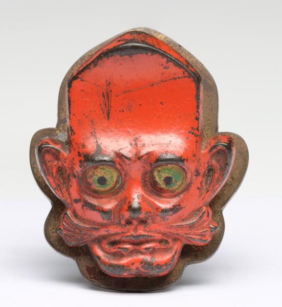 A MUSTACHIOED ELFIN CHARACTER