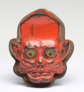 A MUSTACHIOED ELFIN CHARACTER