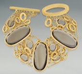 A Nanis 18k Gold and Smoky Qua