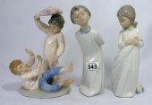 A Nao Pottery Figure of a Boy