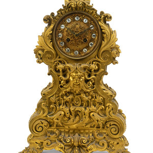 A Napoleon III Gilt Bronze Clock