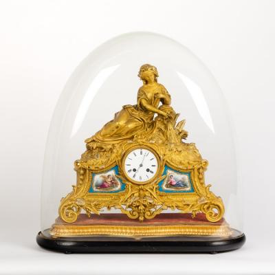 A Napoleon III ormolu and porcelain