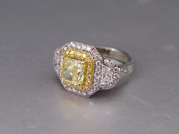 A NATURAL FANCY YELLOW DIAMOND
