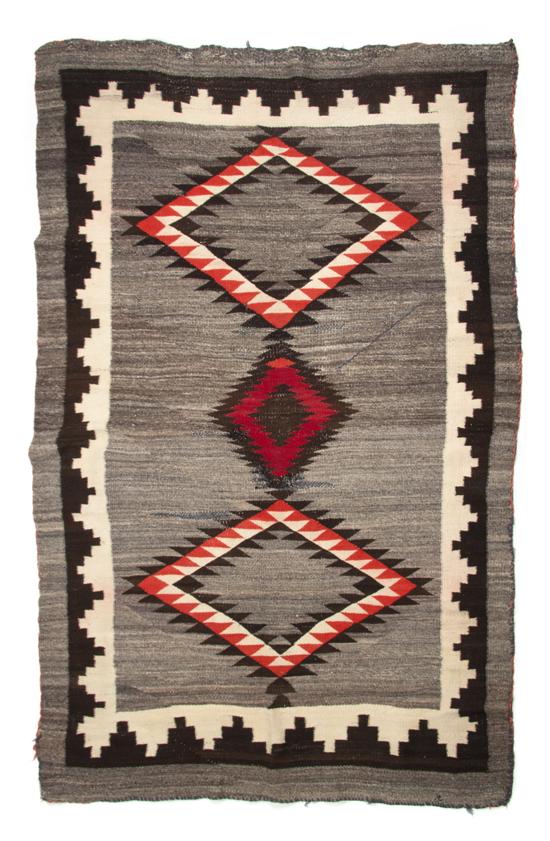 A Navajo Blanket having three