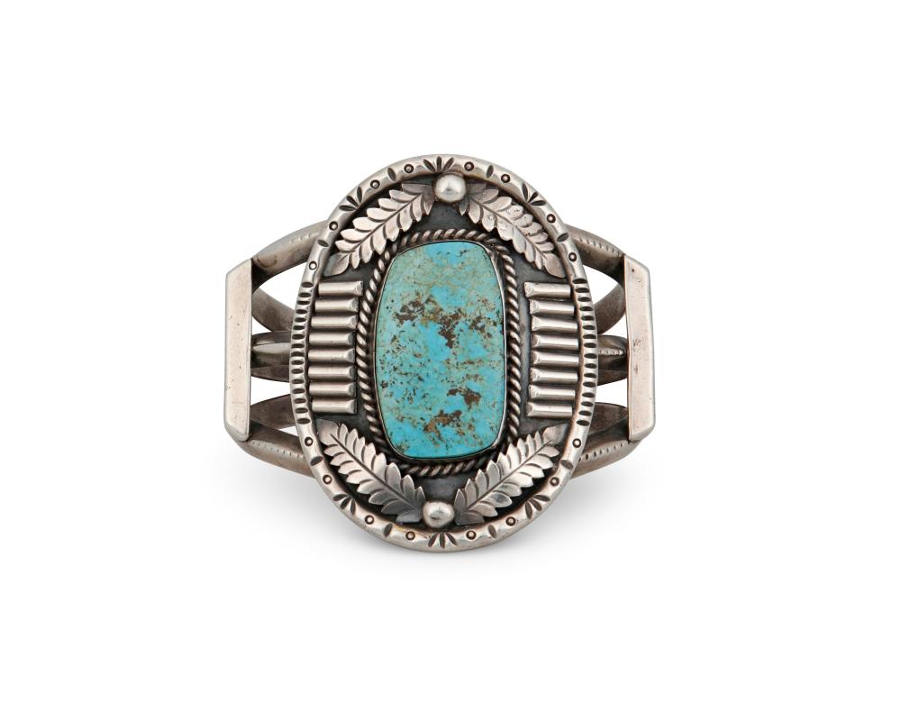 A NAVAJO CAST SILVER AND