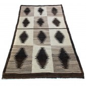 A NAVAJO EYE DAZZLER RUG A Nav