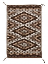 A NAVAJO EYEDAZZLER TEXTILEA N