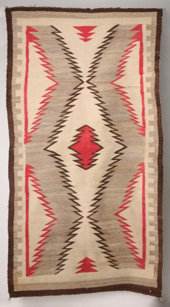 A NAVAJO GANADO WEAVING IN FOUR