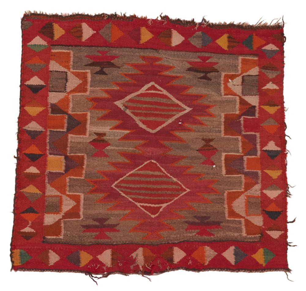 A NAVAJO GERMANTOWN SADDLE BLANKETA