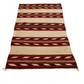 A NAVAJO SADDLE BLANKET WITH R