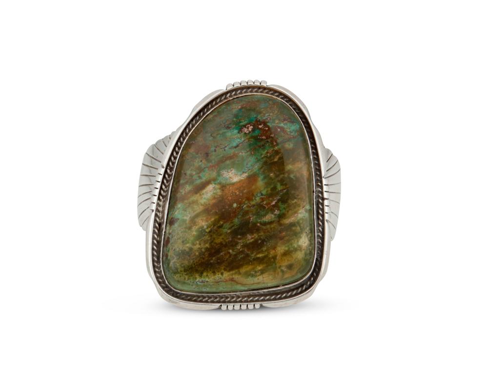 A NAVAJO SILVER AND TURQUOISE