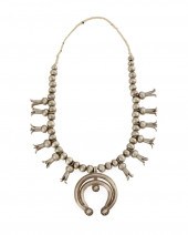 A NAVAJO SQUASH BLOSSOM NECKLA
