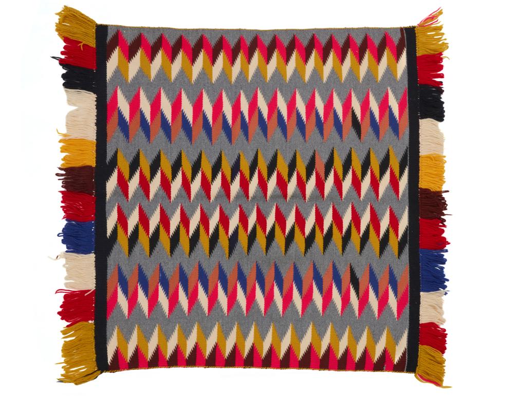 A NAVAJO "SUNDAY" SADDLE BLANKETA