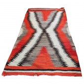 A NAVAJO TRANSITIONAL WEARING