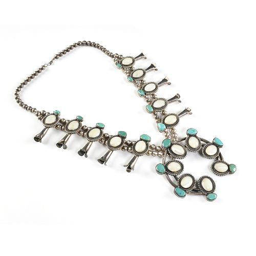 A NAVAJO TRIBAL SILVER,