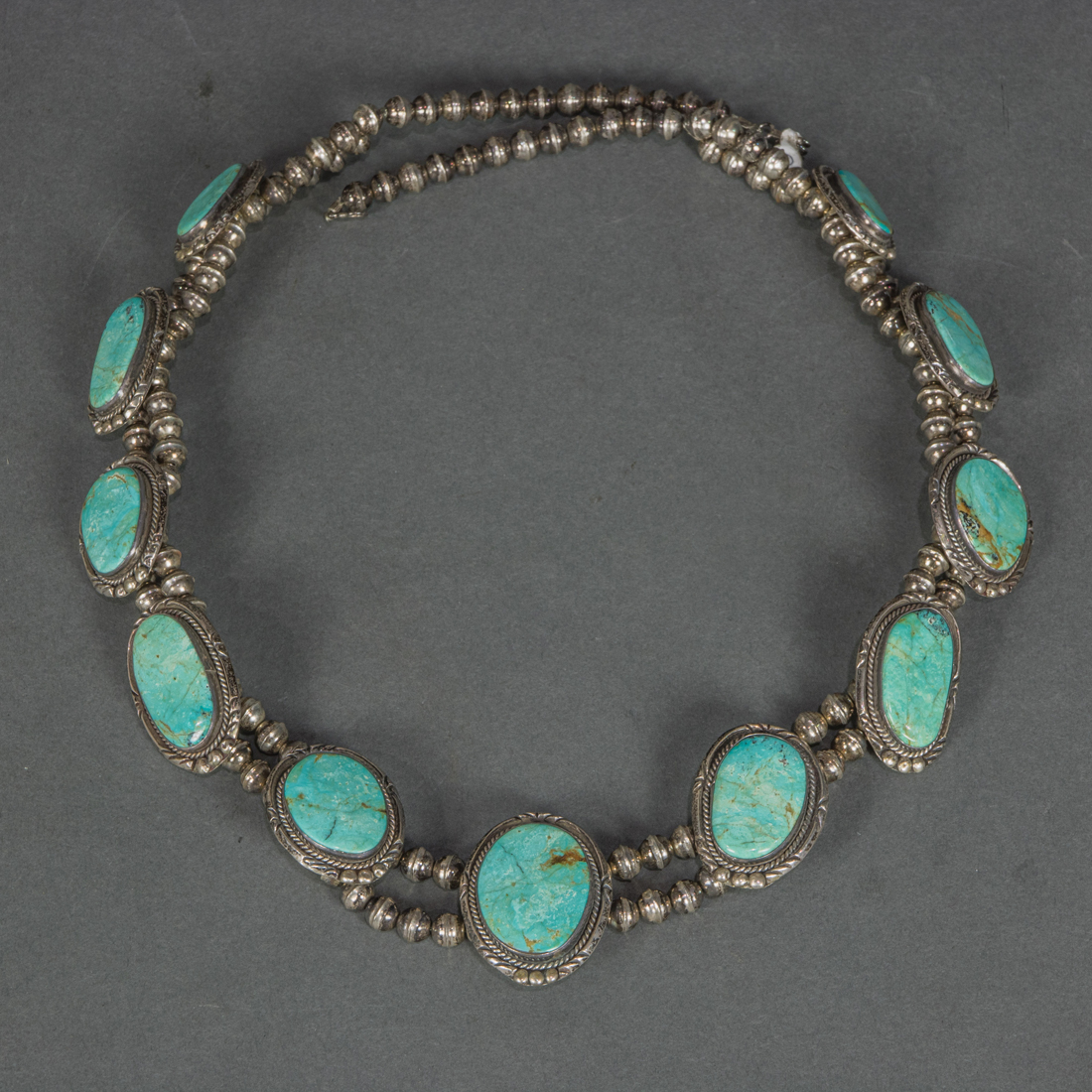 A NAVAJO TURQUOISE STERLING