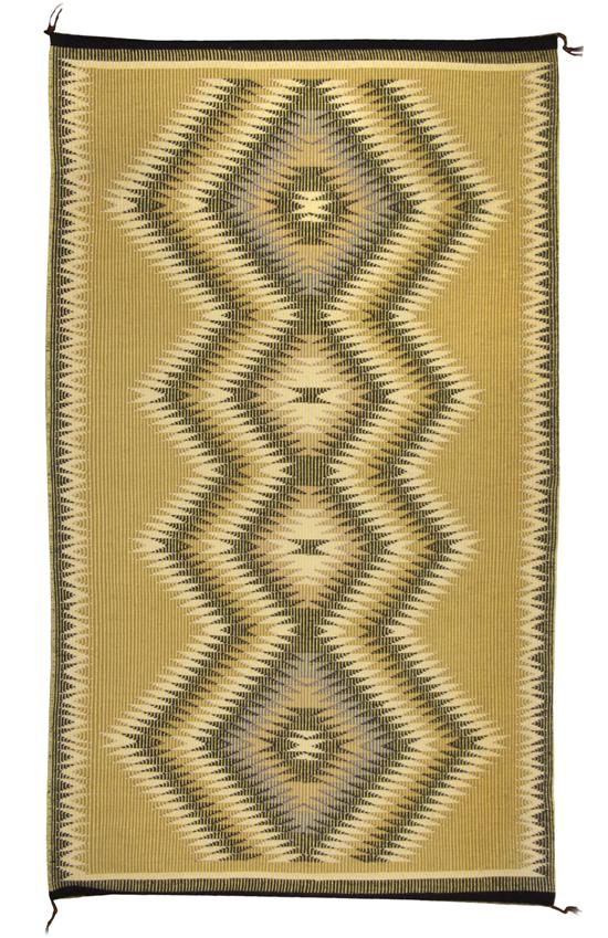 A Navajo Weaving having a raised