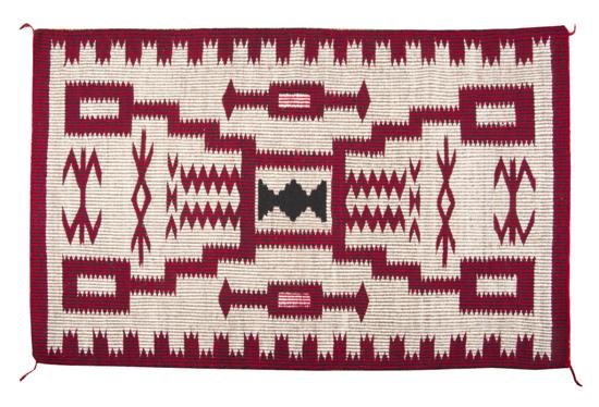 A Navajo Weaving in red black and