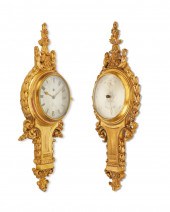 A NEAR-PAIR FRENCH WALL CLOCK