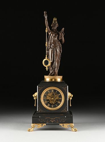 A NEO-GREC PATINATED AND GILT METAL