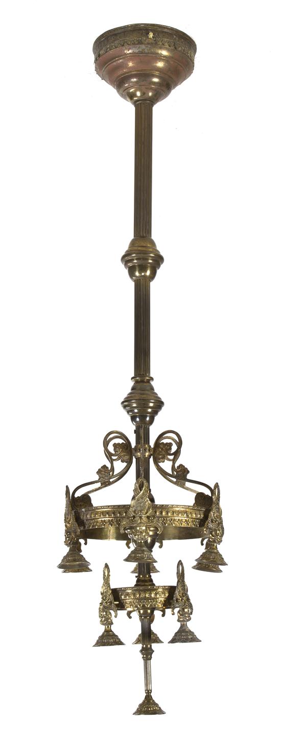 A Neoclassical Brass Torchieres