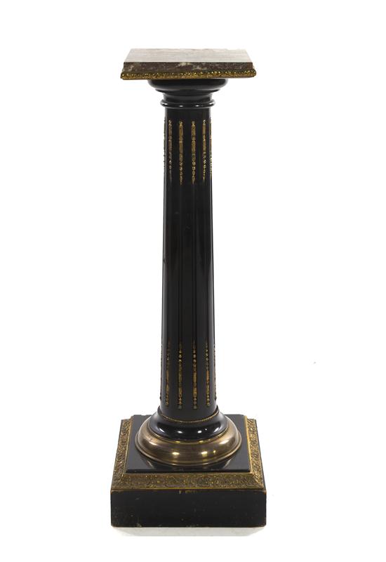 A Neoclassical Ebonized and Gilt
