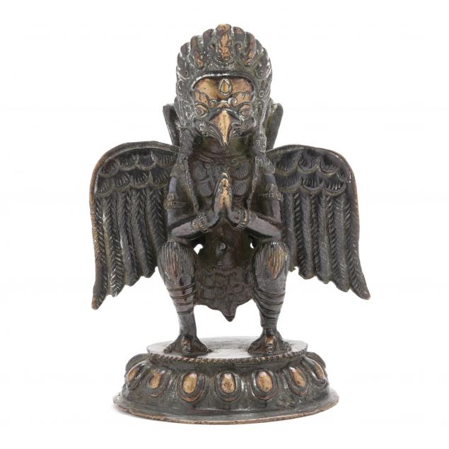 A NEPALESE BRONZE SCULPTURE OF