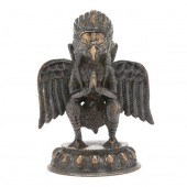 A NEPALESE BRONZE SCULPTURE OF