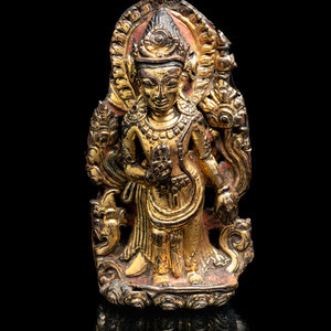 A Nepalese Gilt Copper Alloy Figure