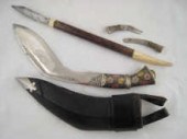 A Nepalese kukri in leather ca