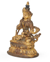 A NEPALESE-STYLE GILT-BRONZE F