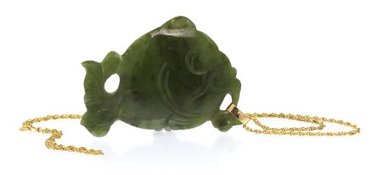 A Nephrite Jade Pendant engraved in