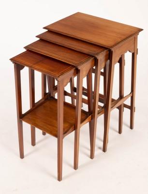 A nest of four mahogany tables, the