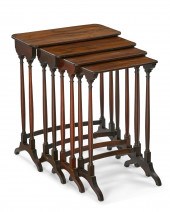 A NEST OF FOUR REGENCY MAHOGAN
