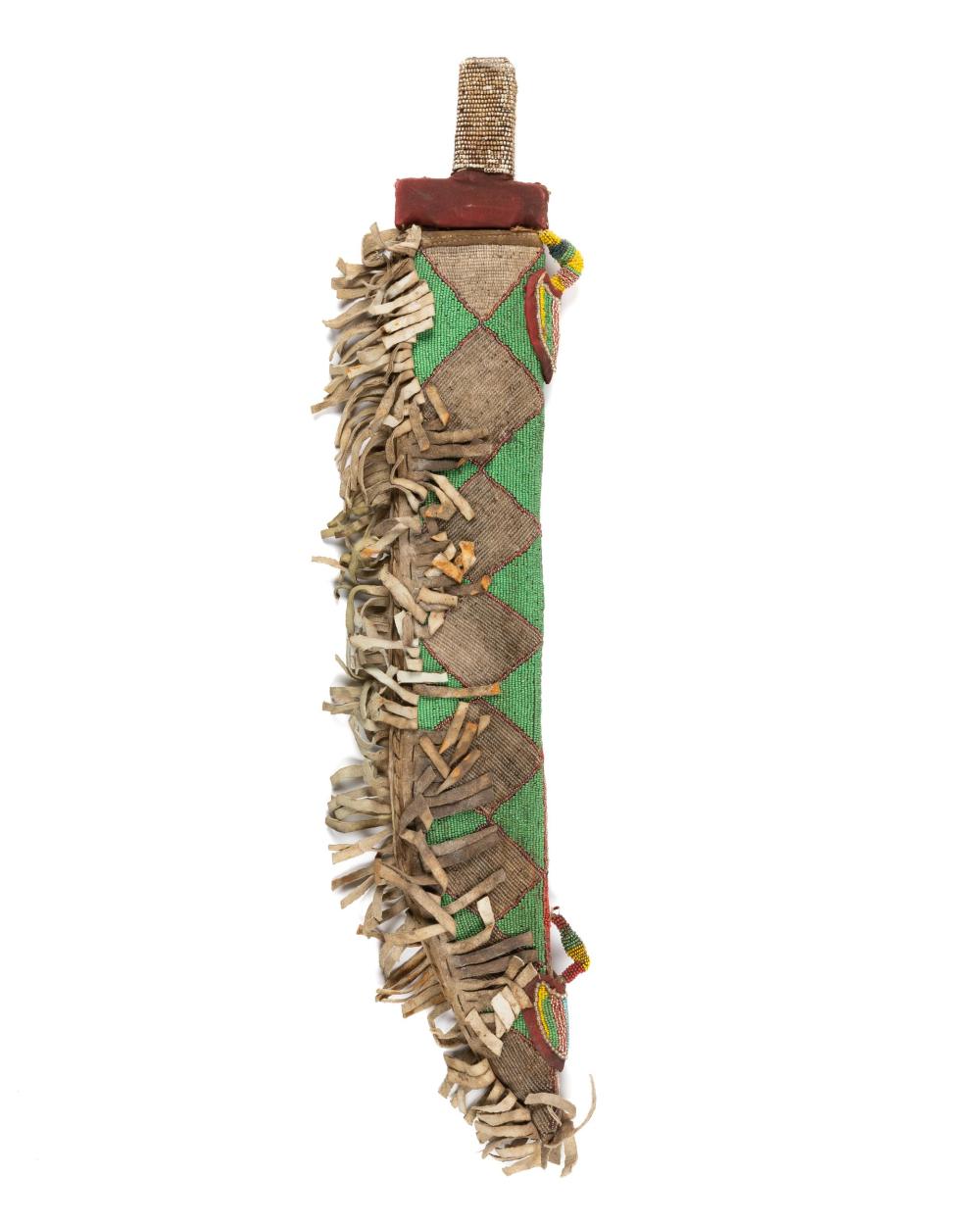 A NIGERIAN SWORD WITH BEADED