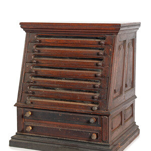 A Nine Drawer Counter Top Spool